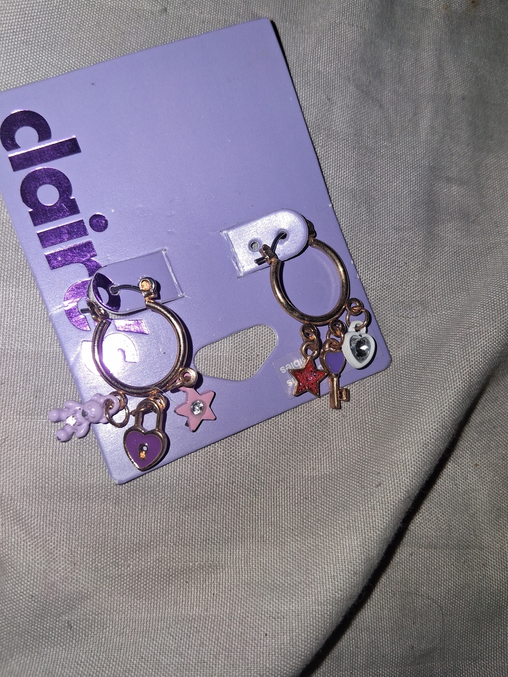 Claire's Rose Gold Hoop Earrings with Pink & Purple Charms